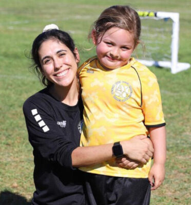 Private Soccer Coach nad her soccer player before a private soccer class