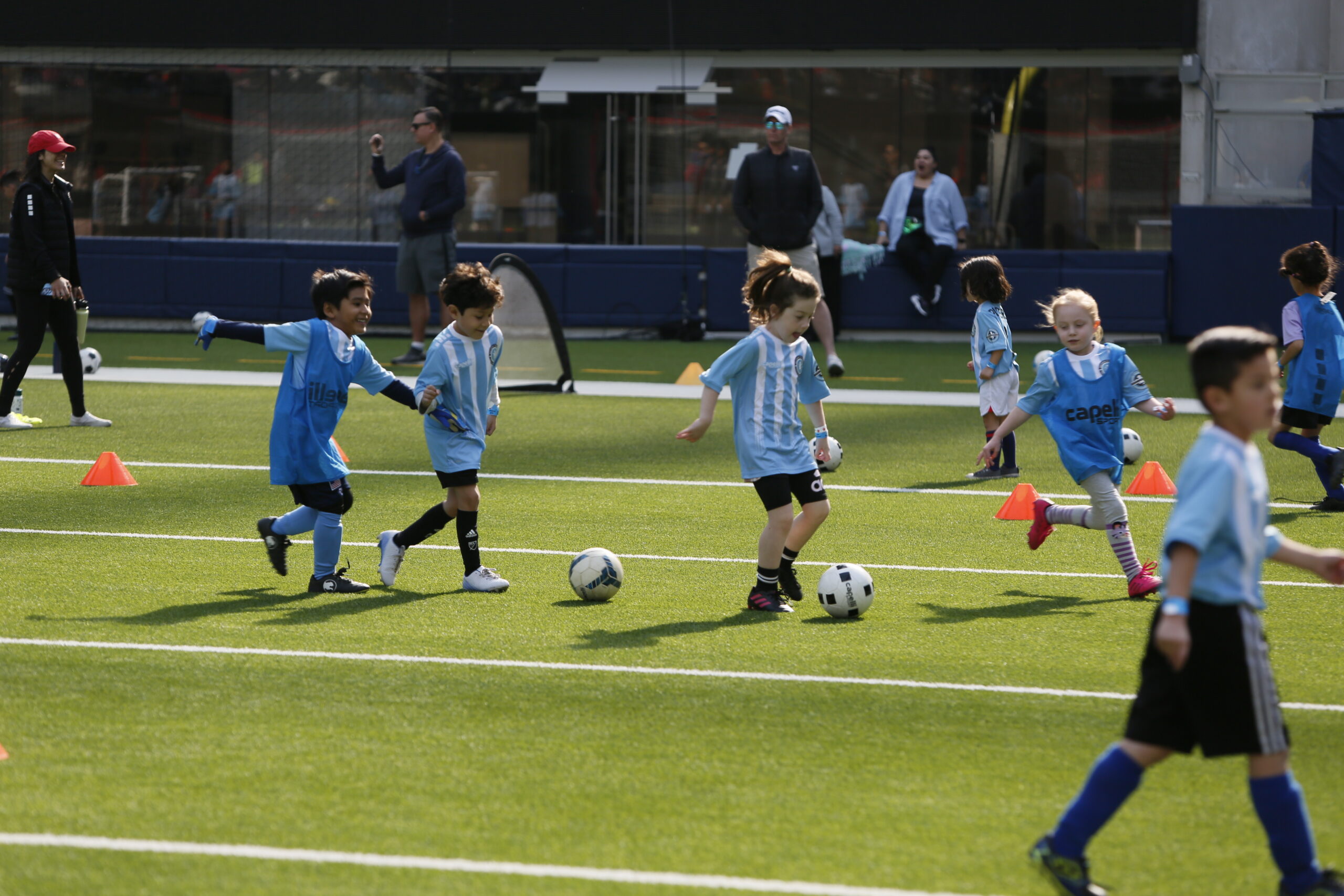 soccer class children. Children enjoying their soccer class