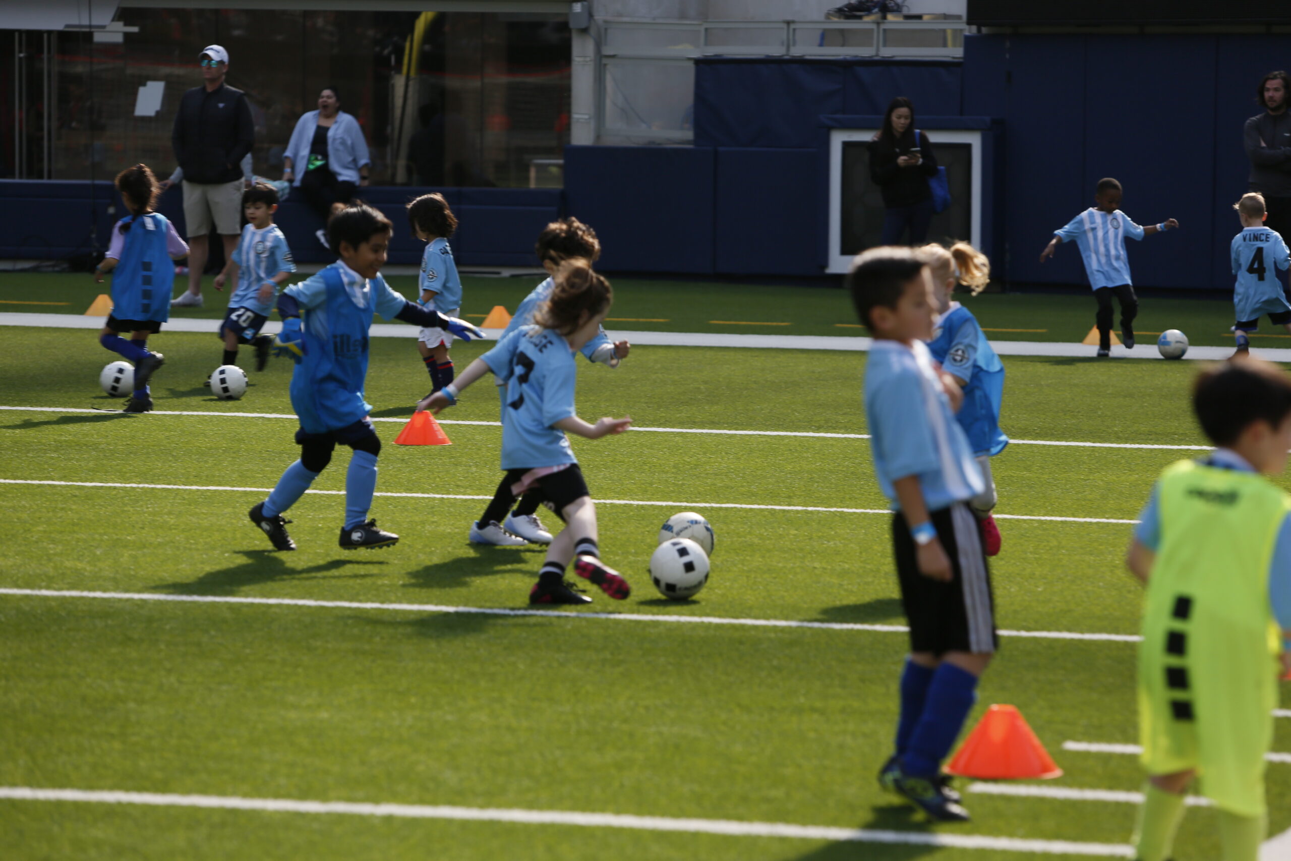 Kids Playing Soccer. Children in a soccer class. Soccer class with children
