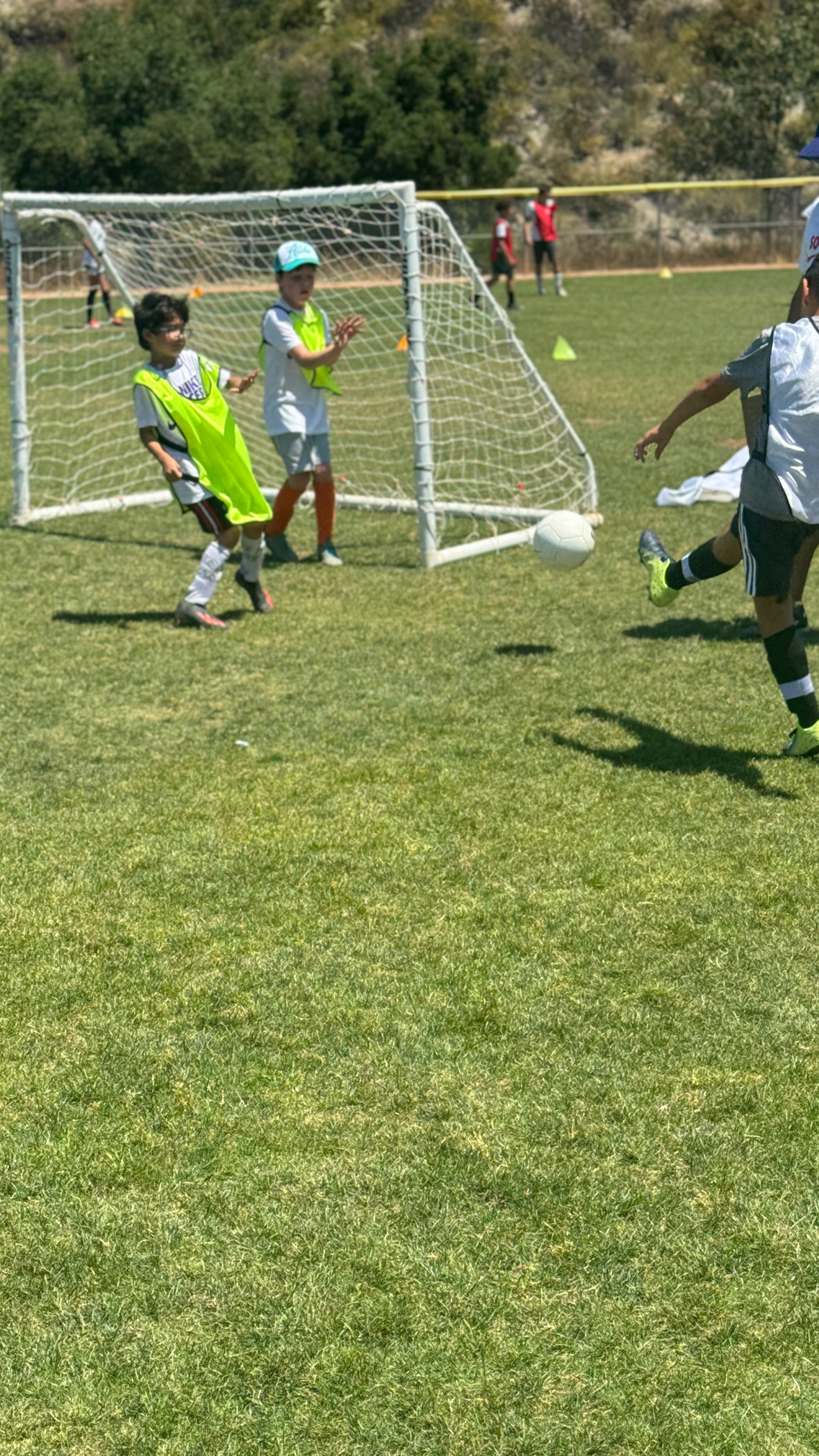 Children playing soccer during homeschool sports class in Pasadena