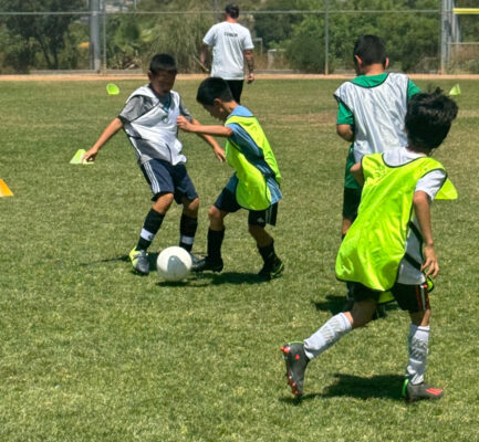 kids at soccer class and getting ready for their soccer league in pasadena . Soccer league burbank